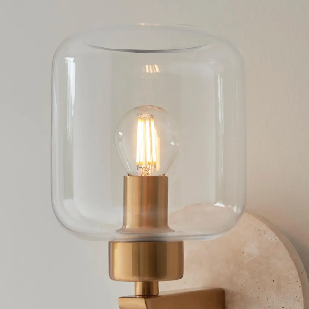 Travi Natural Travertime Stone Wall Light C/W Clear Glass Shade