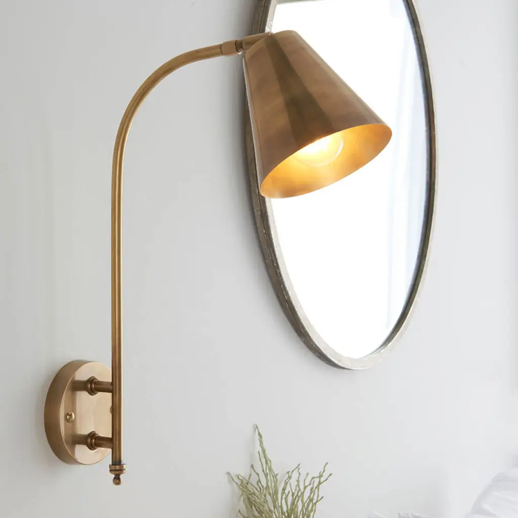 Radha Wall Light in Brass Finish