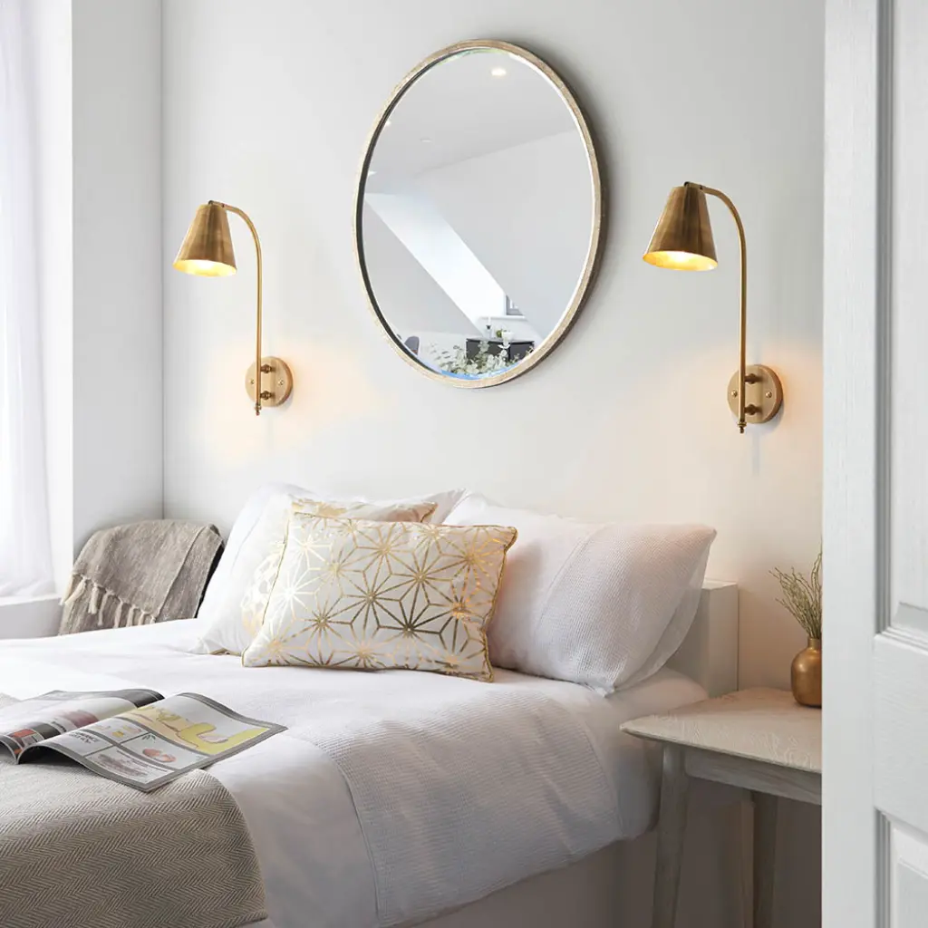 Radha Wall Light in Brass Finish