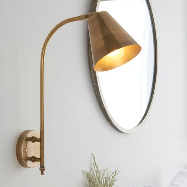 Radha Wall Light in Brass Finish